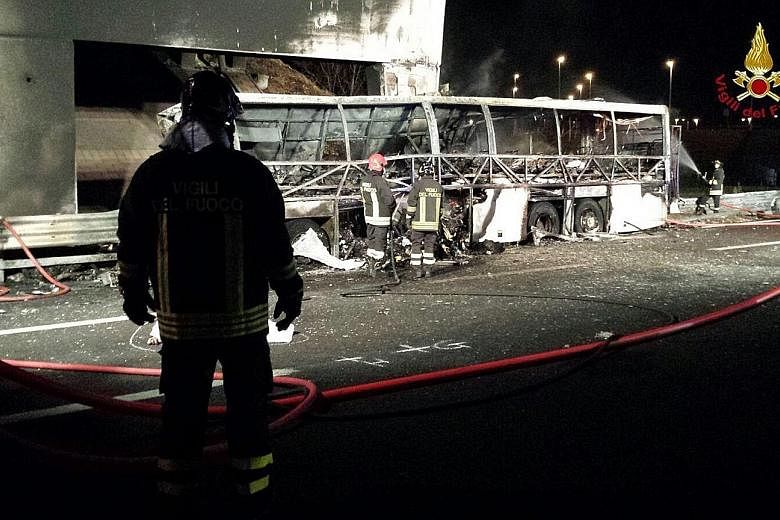 A photo by Vigili del Fuoco (Italian Firewatchers) shows the burnt-out bus after the accident. The vehicle smashed into a bridge pillar on a motorway near Verona on Friday night and was engulfed by a huge inferno.