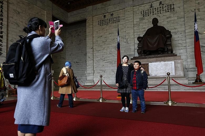 Tourists at Chiang Kai-shek Memorial Hall in Taipei earlier this month.