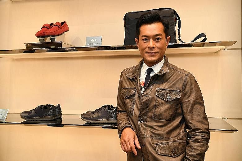 Hong Kong actor Louis Koo at the opening of Italian luxe brand Tod's boutique at Marina Bay Sands.