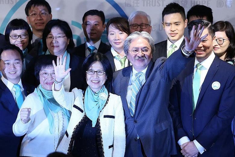 Mr Tsang and his wife, Lynn, at the press conference to announce his candidacy last week. The Harvard-educated former financial secretary has consistently been the front runner in opinion polls about the public's choice for chief executive.