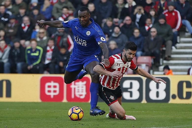 Leicester's Wes Morgan hauls down Southampton's Shane Long in the box, resulting in an 86th-minute penalty to the home side that was converted by Dusan Tadic. James Ward-Prowse (26th) and Jay Rodriguez (39th) were Southampton's other scorers as they 