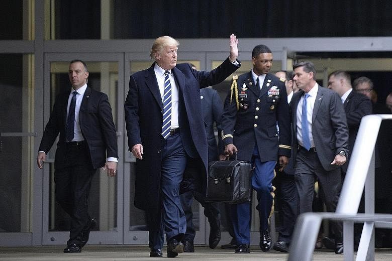 "I am with you 1,000 per cent," Mr Trump told the intelligence community during a visit to the CIA headquarters in Langley, Virginia, last Saturday.
