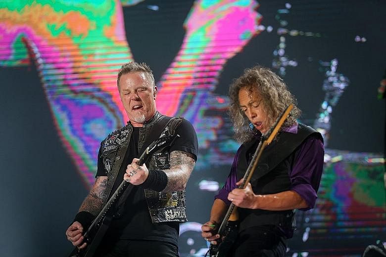 Metallica's James Hetfield (left) and Kirk Hammett (right) at the Singapore concert on Sunday.