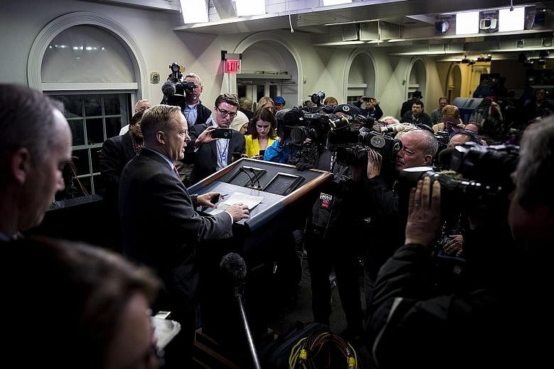 Mr Spicer speaking to reporters at the White House last Friday. He said Mr Trump drew "the largest audience to ever witness an inauguration", but there is no evidence to support this.