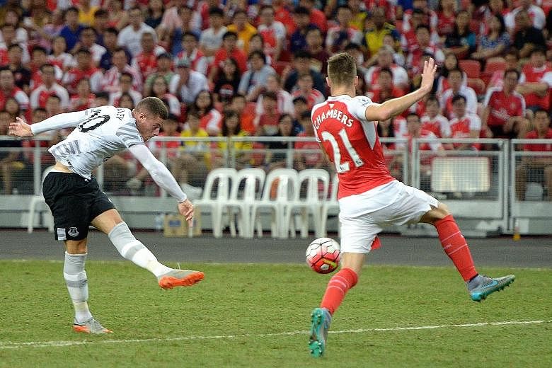 Ross Barkley scoring for Everton in their eventual 3-1 defeat by Arsenal when the two sides contested the Premier League Asia Trophy at the National Stadium in 2015.