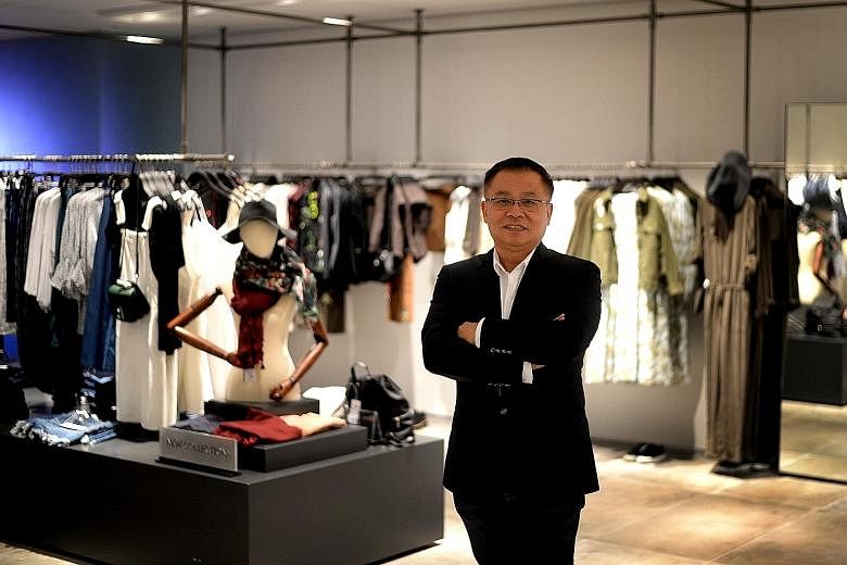 Urban Revivo vice-president Raymond Ngoh at its Raffles City store, which opened earlier this month and sells clothes and accessories for men and women.