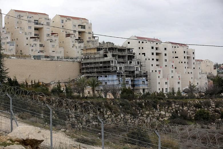An Israeli settlement being built in the West Bank city of Hebron this month. Such settlements are viewed by much of the world as illegal and major stumbling blocks to peace efforts as they are built on land the Palestinians see as part of their futu