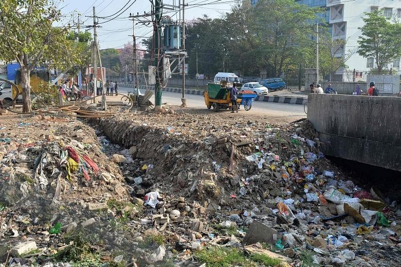 This photo taken on Jan 10 this year shows a storm-water drain in Bengaluru. The surge in the city's population since the start of the 1990s has placed huge pressure on its municipality, which stands accused of inadequate urban planning and, in parti