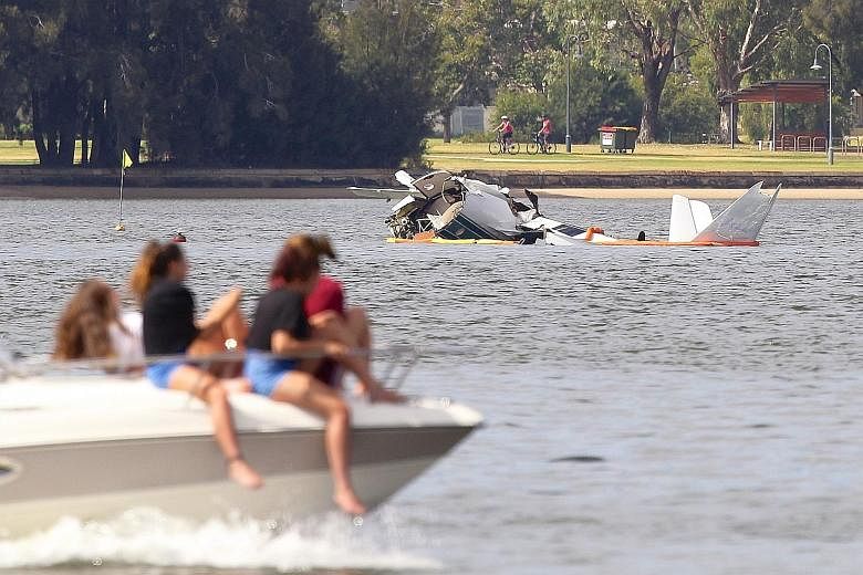 The debris of the Grumman G-73 Mallard seaplane, which went down in full view of thousands of spectators. Acting Commissioner of Police Stephen Brown said his first thought was relief that it went down some distance away from the crowds gathered on t