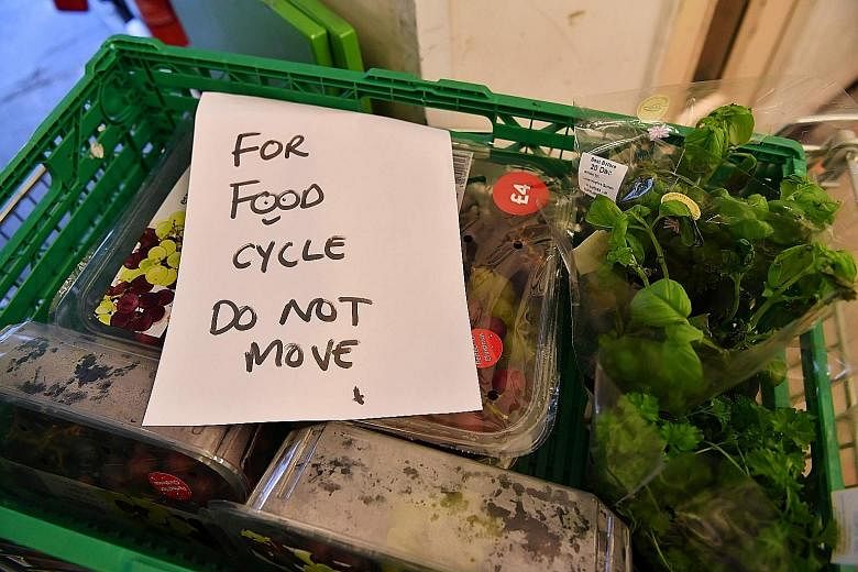 Food donated by a Waitrose supermarket awaiting collection by volunteers in London. The UN Food and Agriculture Organisation's estimates suggest that food left uneaten in Europe could feed a quarter of the 800 million people worldwide who go to bed h