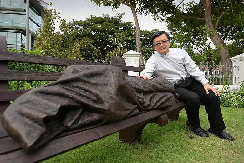 Monsignor Heng believes the Homeless Jesus sculpture is an appropriate addition to the grounds of the Cathedral of the Good Shepherd. Although the artwork can be found in Catholic and Protestant churches in some 50 cities, the one in the cathedral he