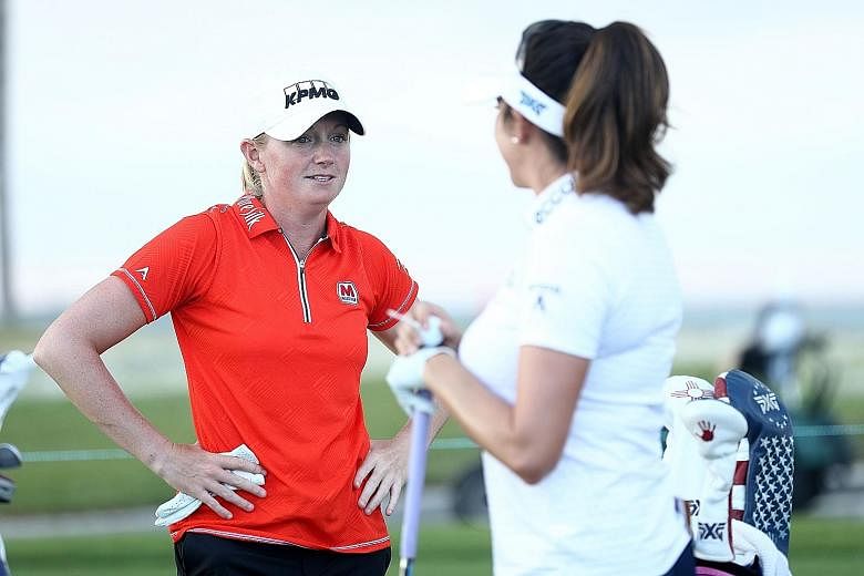 Stacy Lewis (above) had two eagles and seven birdies to put her level with Lexi Thompson at 23-under total of 196 after three rounds of the LPGA Pure Silk Bahamas Classic.