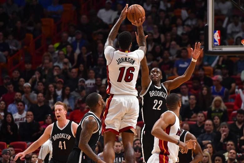 Nets losing streak over with victory over likely playoff-bound Miami Heat –  New York Daily News