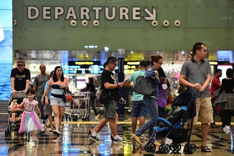 Passenger traffic at Changi Airport hit a record 58.7 million last year.