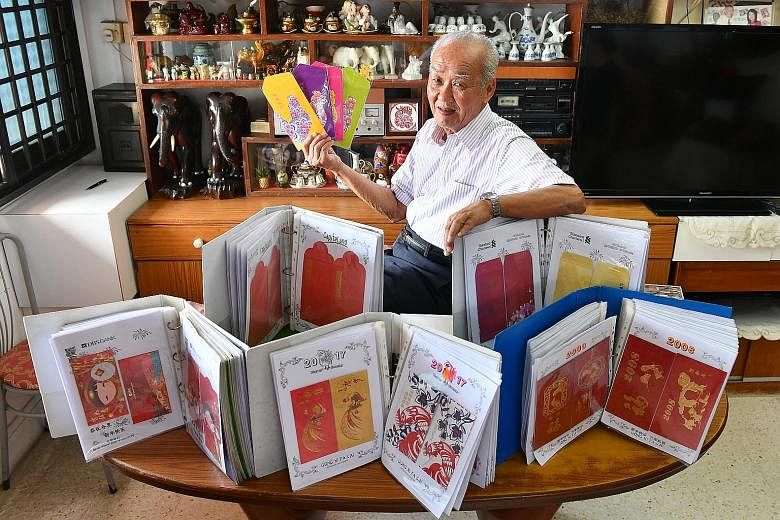 Mr Samson Low files them in a way that showcases the front and back of each hongbao. He says he has spent a few thousand dollars over the years on his hobby.