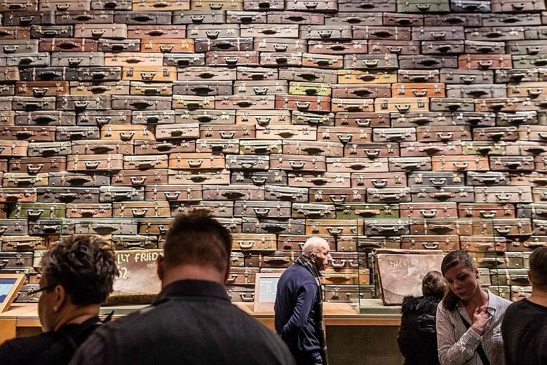 A wall of suitcases, symbolising the deportation of Jews to death camps, forms part of a permanent exhibition at Poland's new Museum of the Second World War which opened in Gdansk on Sunday. Conceived by EU president Donald Tusk during his time as Po