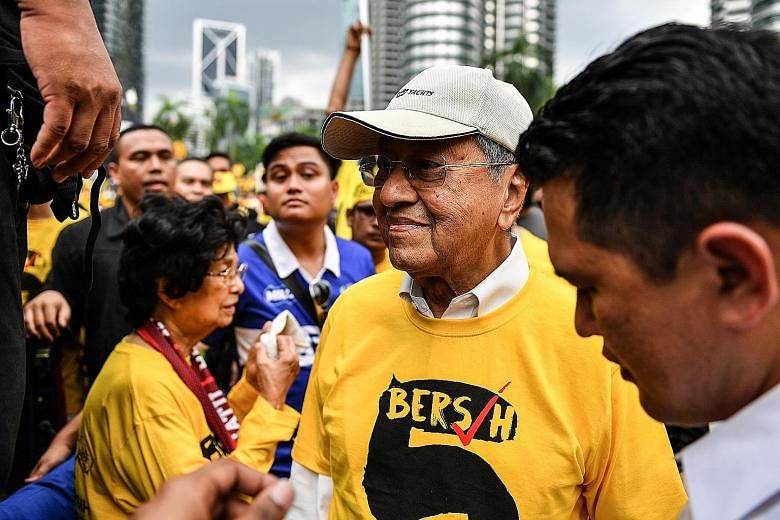 Former Malaysian prime minister and former Umno leader Dr Mahathir taking part in the Bersih 5 protest in Kuala Lumpur on Nov 19 demanding the resignation of Prime Minister Najib over an alleged corruption scandal.