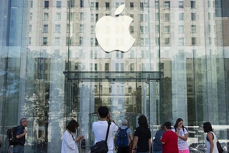 Apple's first fiscal quarter gains were tempered by a cautious outlook for the current quarter, which it mainly attributed to the strong US dollar. A strong dollar forces firms to raise prices in overseas markets.