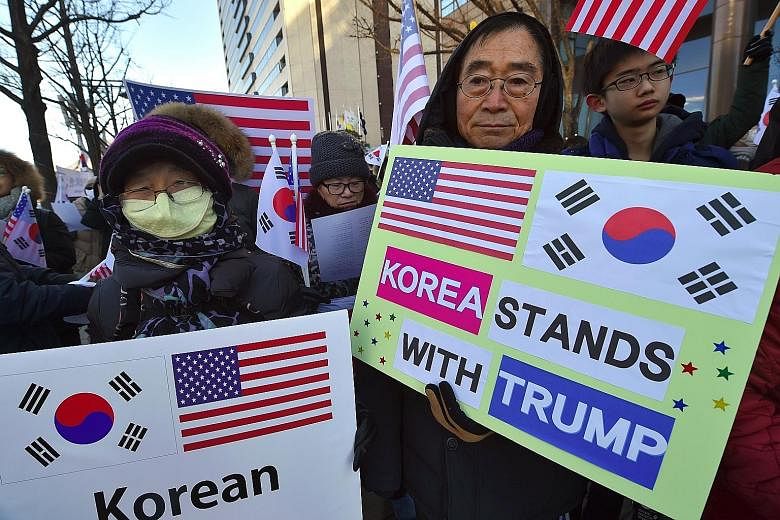 The US Defence Secretary's visit was met with anti-war activists' protests against the Thaad deployment and a pro-Trump rally by Christians.