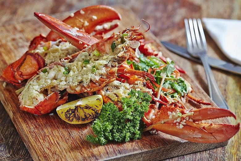 Plaza Brasserie is offering Surf 'N Turf dishes including steamed lobster in hua tiao sauce.