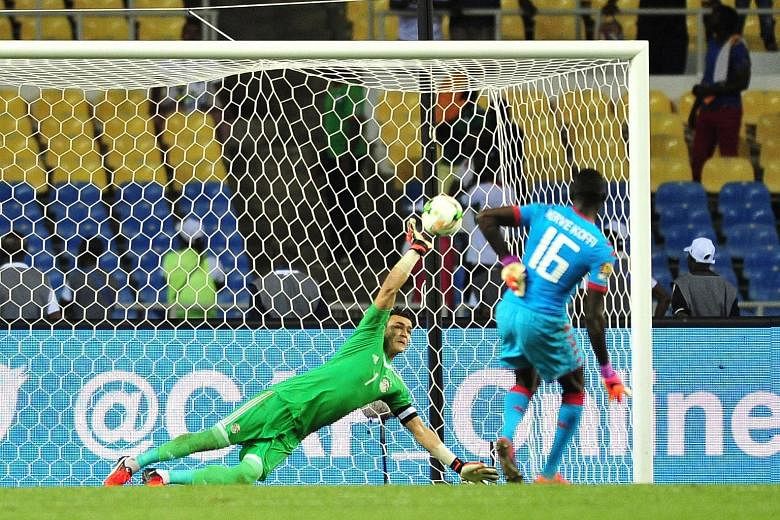 Essam El Hadary saving a penalty from Burkina Faso custodian Herve Koffi during the semi-final shoot-out in Libreville to keep Egypt alive. The 44-year-old then denied Bertrand Traore in the last kick to take his team to their ninth Africa Cup of Nat