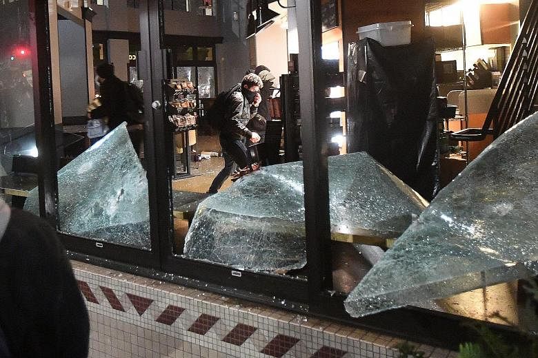 United States President Donald Trump threatened to withhold federal funds for the University of California, Berkeley, after hundreds of protesters smashed shop windows, set fires and clashed with police as they forced a right-wing speaker to cancel h