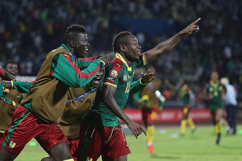 Christian Bassogog celebrating after scoring in the 90th minute to seal the win. Cameroon beat Ghana 2-0 to progress to the Africa Cup of Nations final.