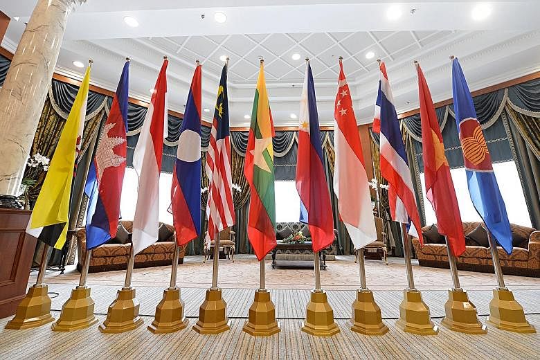 Flags of member states standing tall during an Asean summit in Brunei. Faced with the latest shifts in great power politics, South-east Asian nations will need to recalibrate their ties with the US and China to maintain some measure of autonomy, with