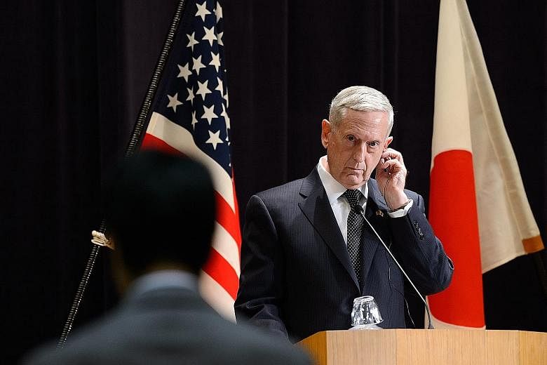 Mr Mattis in Tokyo yesterday, on a trip which also took in Seoul. The US defence chief made clear that Washington was ready to answer any threats its allies in the region may face.