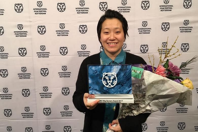 Local film-maker Kirsten Tan with the VPRO Big Screen Award at the International Film Festival Rotterdam in the Netherlands on Friday.