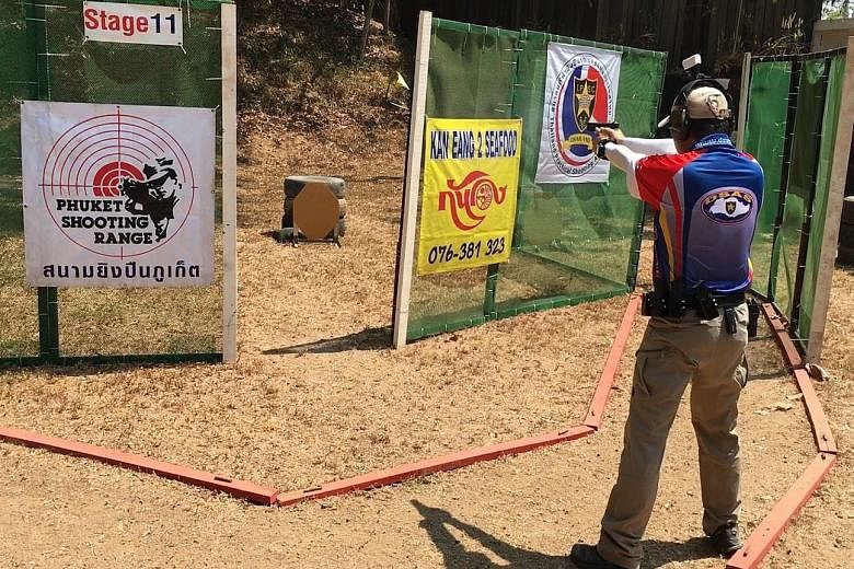 Mr Timothy Ngui at a shooting competition in Phuket last March.