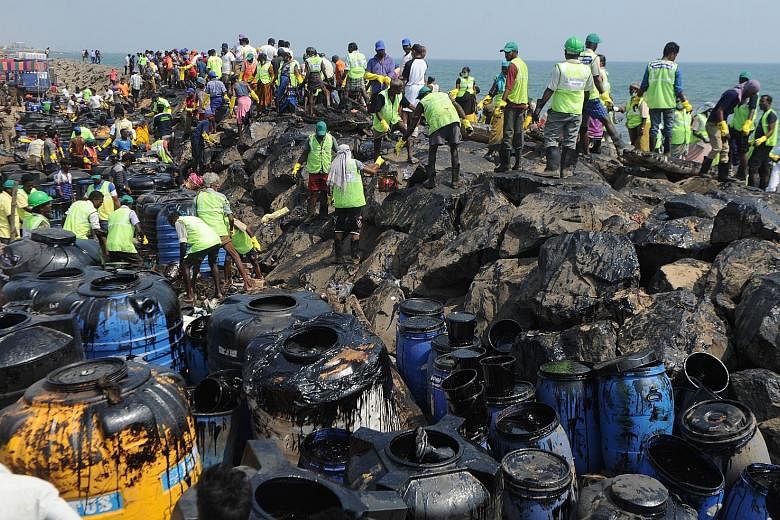 Thousands of volunteers and Coast Guard personnel are working to clean sludge from shores near the Indian city of Chennai, more than a week after an oil spill that activists said could have dire repercussions for wildlife and fishery.