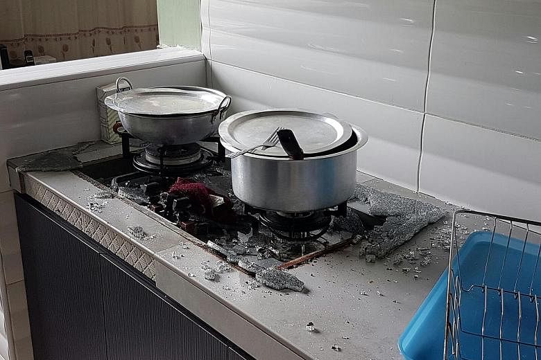 Ms Suzalinah's glass-top stove shattered at about 12.45pm yesterday. Nobody was in the kitchen at the time.
