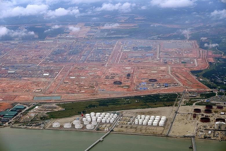 The Pengerang Integrated Petroleum Complex in Johor is under construction. Oil industry executives believe that, despite Saudi Aramco's pullout, the project will still proceed.