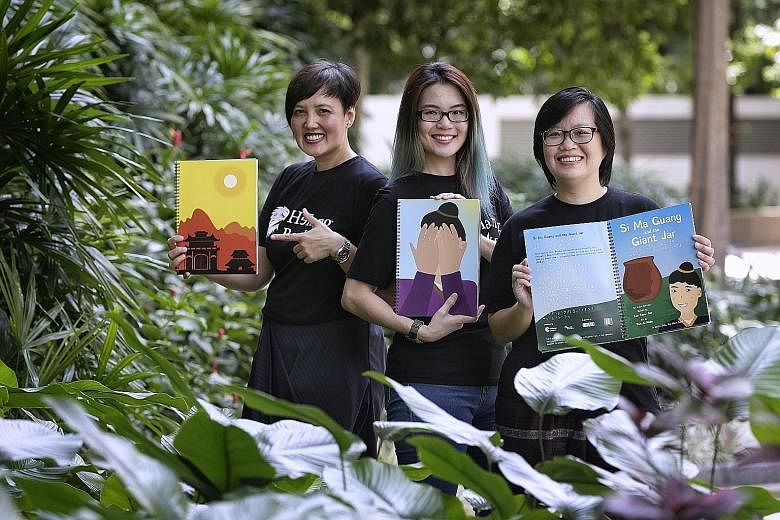 Si Ma Guang And The Giant Jar's author, Ms Lee (far right), with illustrator, Ms Tan (centre), and Helang Books founder, Ms Hidayah. The book has Braille dots for the blind, and text in a font designed for readers with dyslexia.