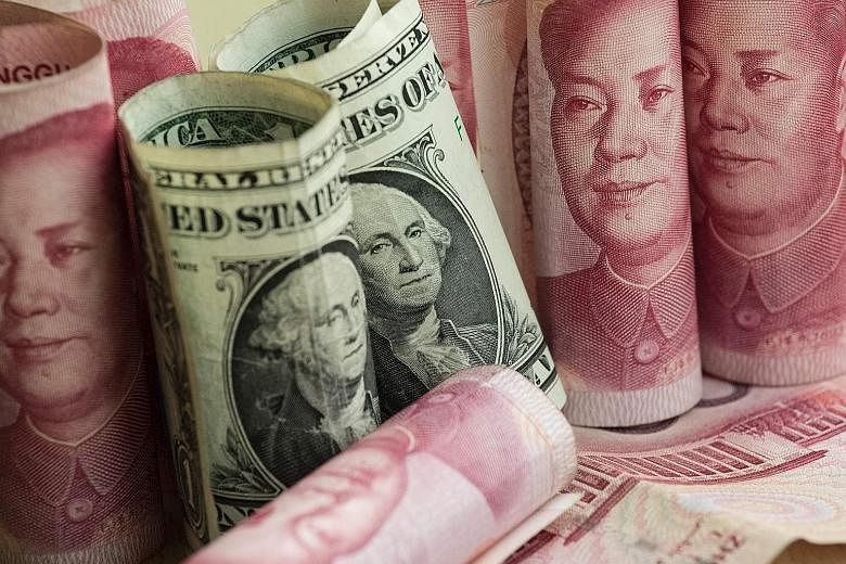 The yuan fell 6.6 per cent against the rising dollar last year, its biggest annual drop since 1994.