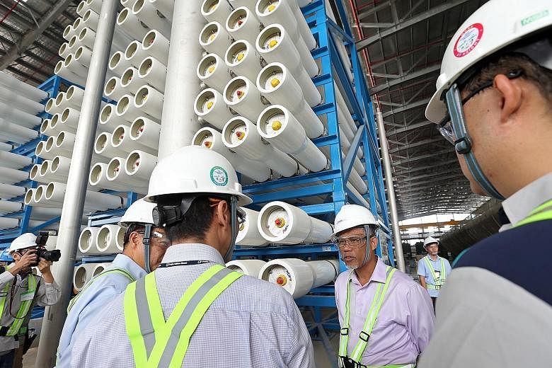 Mr Masagos Zulkifli visiting the Tuas Desalination Plant 3 yesterday. The Environment and Water Resources Minister said the water price increase is meant to ensure the reliability of Singapore's water infrastructure, and to reflect the scarcity of wa