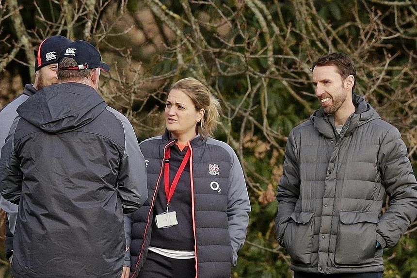 Above: England football manager Gareth Southgate was invited to share his expertise during training, with Eddie Jones hoping it will help his side conquer their nerves against Wales.