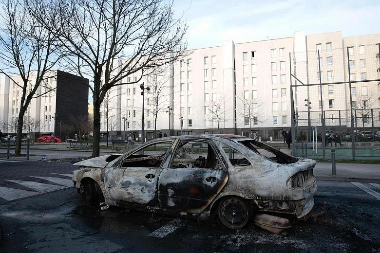 Angry French youths clashed with police and burned cars in the Paris suburb of Aulnay-sous-Bois for a third night in a row on Monday, amid anger over the alleged rape of a man during his arrest last week.