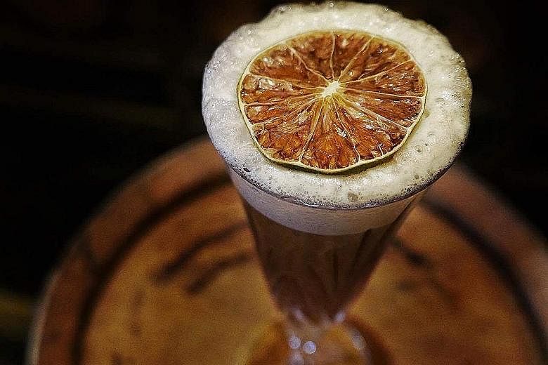 Manhattan's Aged Singapore Sling will be served at Raffles Hotel's Long Bar on Sunday.