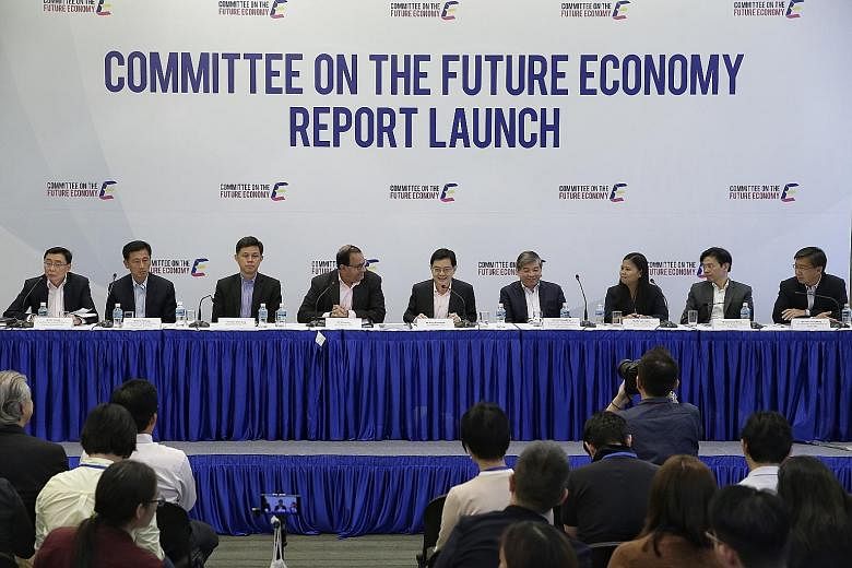From left: Mr Bill Chang, co-chairman, sub-committee on future jobs and skills; Mr Ong Ye Kung, co-chairman, sub-committee on future jobs and skills; Mr Chan Chun Sing, deputy chairman, Committee on the Future Economy; Mr S. Iswaran, co-chairman, Com