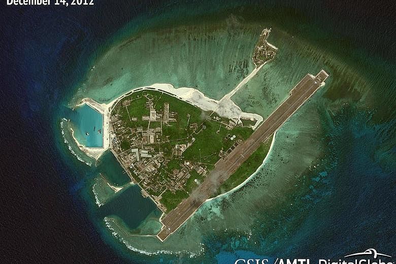 Left: A satellite image of Woody Island, the largest of the Paracels, taken in December 2012. Right: A picture taken last month shows extensive build-up on the island, says a new report. This could boost China's surveillance and power projection capa