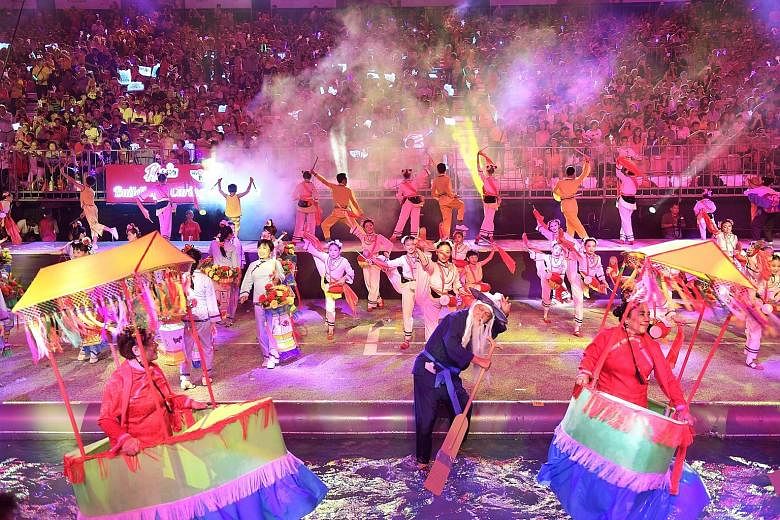 Performers splashed through a 360m by 3m waterway that is one of the features at this year's Chingay street parade, which is themed Soundwaves Chingay, WeCare Singapore. The three-hour spectacle last night at the F1 pit building featured multicoloure