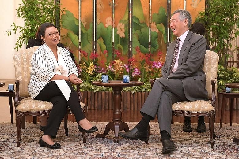Indonesian Foreign Minister Retno Marsudi calling on Prime Minister Lee Hsien Loong at the Istana yesterday, as they reaffirmed the importance of closer bilateral cooperation. Yesterday, she and Foreign Minister Vivian Balakrishnan also announced the