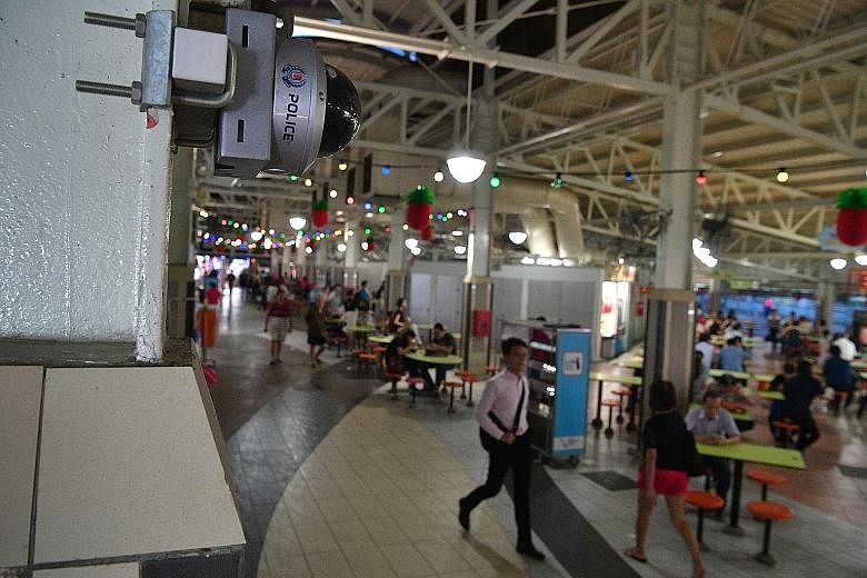 A police camera at a hawker centre in Ang Mo Kio Avenue 6. The police installed 51 new cameras at Ang Mo Kio Town Centre in June last year, under the PolCam 2.0 programme, as part of the field-testing.
