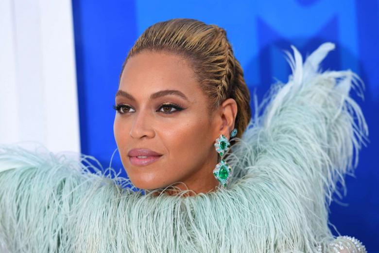 All eyes on Beyonce as pregnant powerhouse leads Grammys charge The
