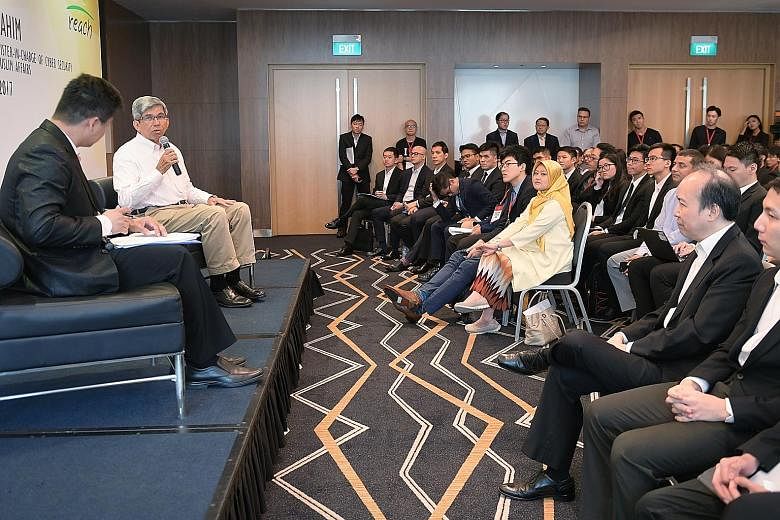 Dr Yaacob speaking at the dialogue with tertiary students yesterday, held as part of an inaugural Singapore Model Cabinet event. With him was moderator Charles Phua, president of the Association of Public Affairs at the Lee Kuan Yew School of Public 
