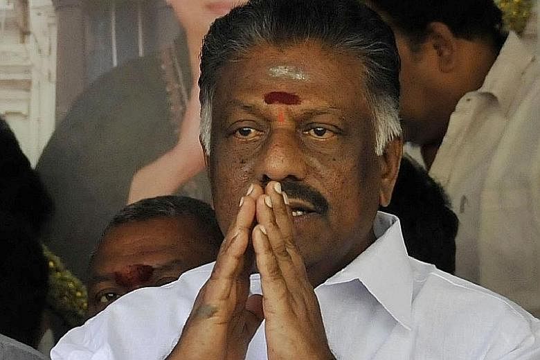 Former acting chief minister of Tamil Nadu, Mr Panneerselvam, at a press conference at his home in Chennai last Wednesday. While in office in the past two months, he has successfully handled relief operations for a cyclone that hit Tamil Nadu.