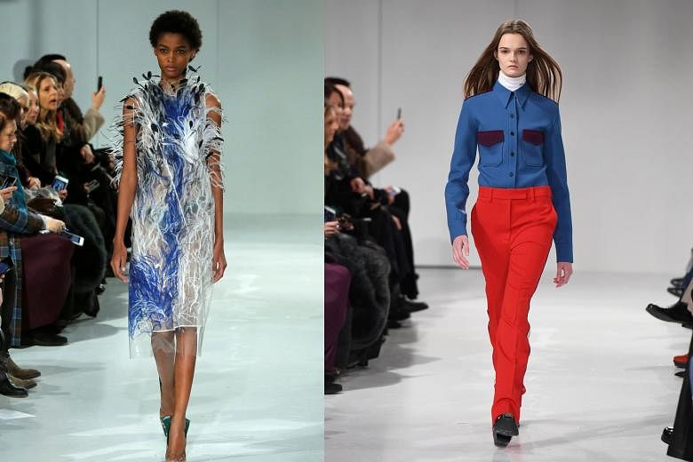 The collection included plastic sheath dresses covered in feathers (left) and button-up Western-pocket shirts over turtlenecks (right).