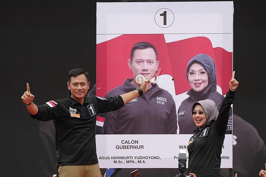 Mr Agus (far left), son of former president Yudhoyono, might be seen as a political novice by some, so choosing Ms Sylviana, a City Hall veteran, as his running mate might have been a move by the Democratic Party to counterbalance that perception. Mr